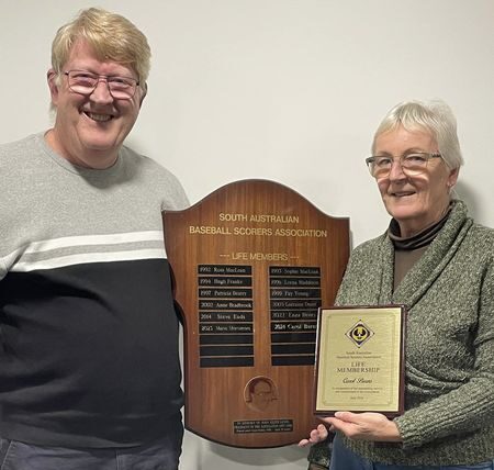 President Michael Philips with new Life Member Carol Burns